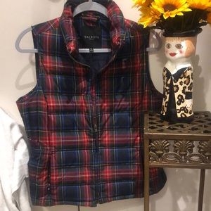 Talbots plaid puffer vest with full zipper and two zipper pockets.